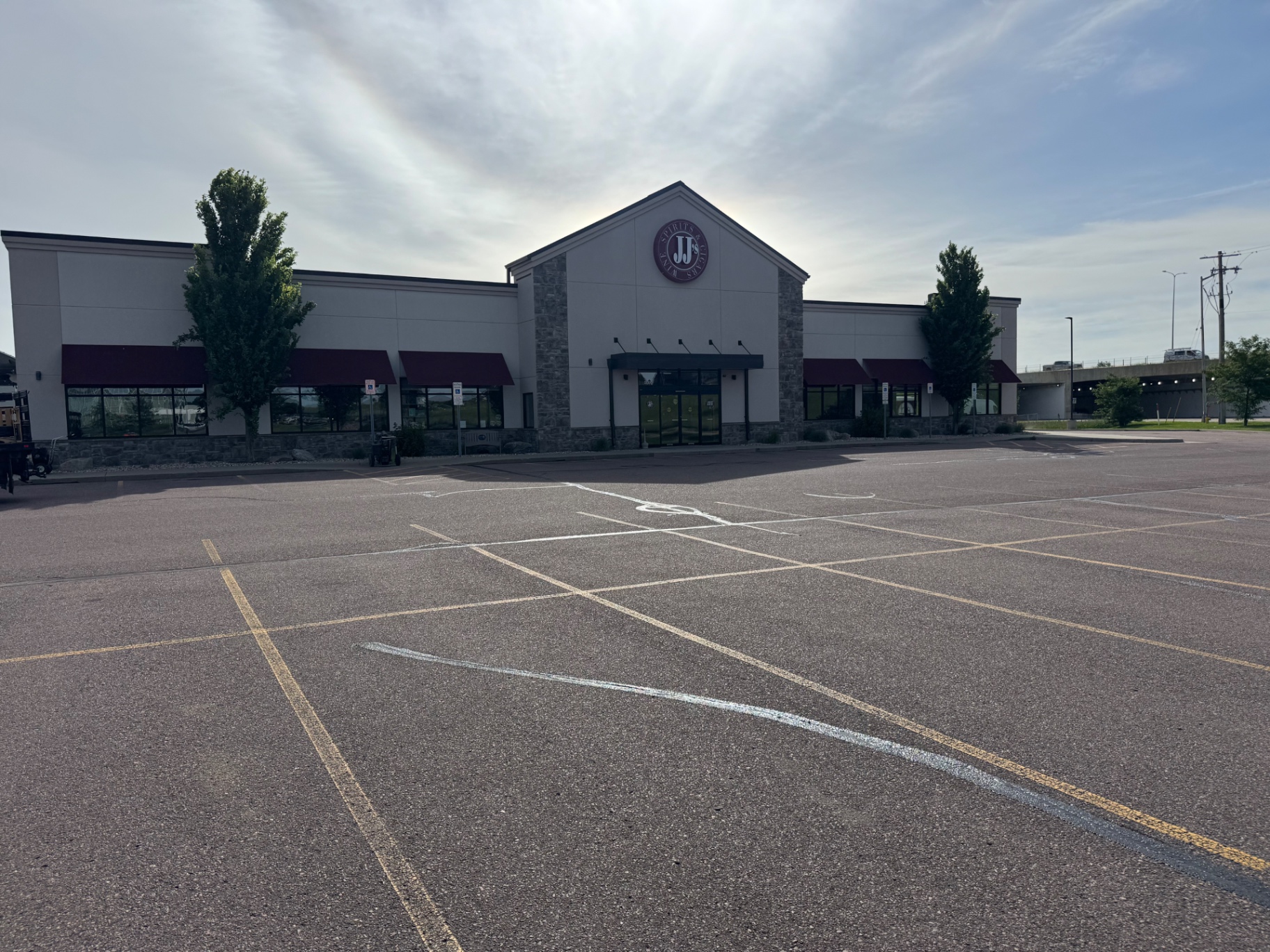 Sioux Falls parking lot seal coating before and after — before