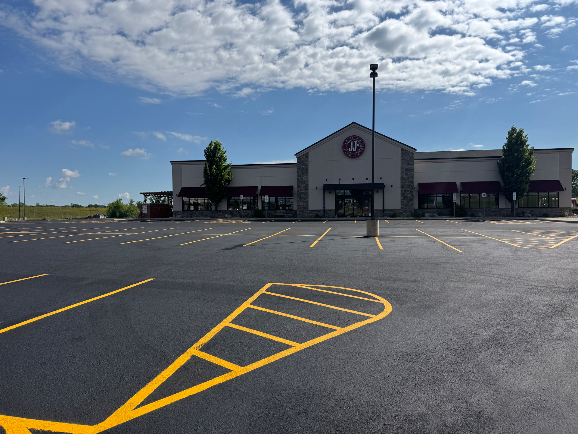 Sioux Falls parking lot seal coating before and after — after